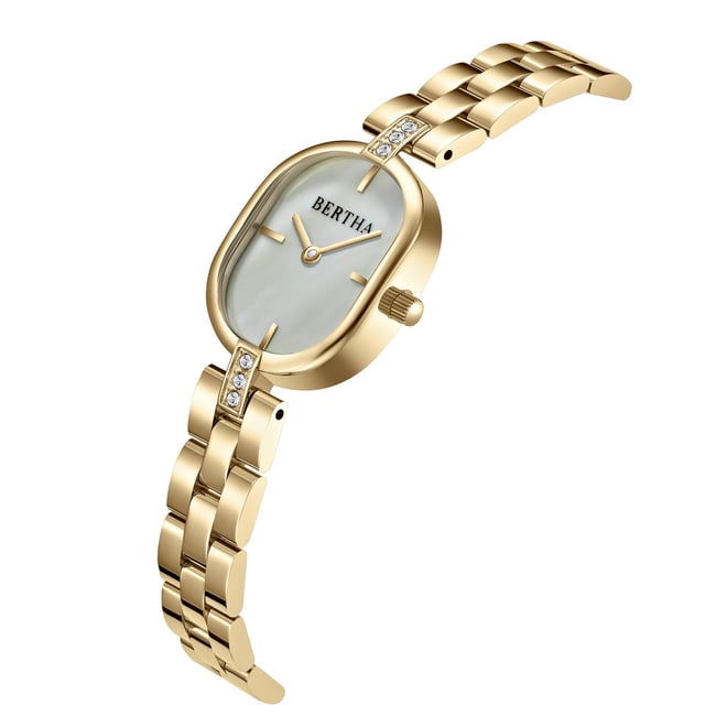 Stainless Steel Case and Case Back, Stainless Steel Crown, Mother of Pearl Dial w/ Applied Index, Brass Hands, Japan PC20 Movement, 5 ATM Water Resistant, Case Diameter 20mm w/ Crown 23mm, Band Width 10mm, Case Thickness 8mm.