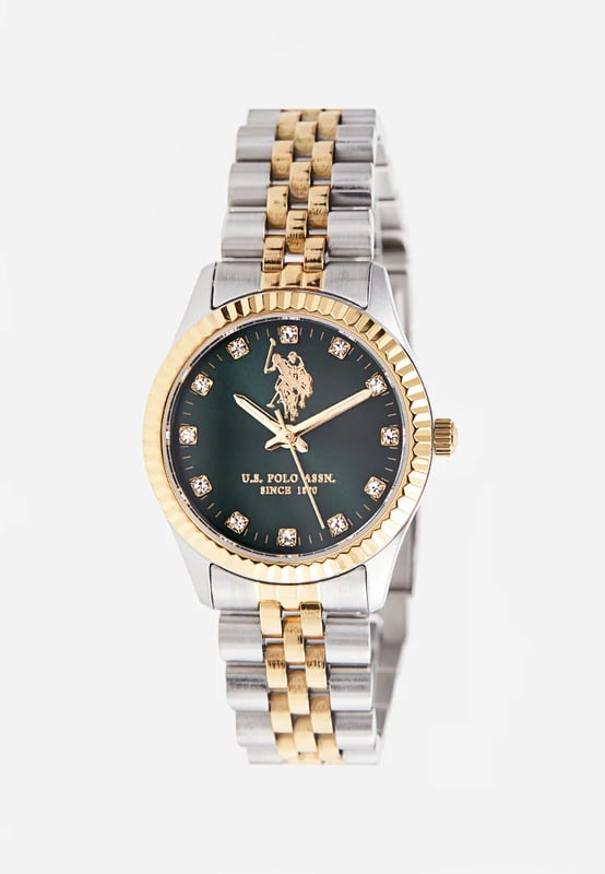 Quarzwerk (hohe Präzision)                      30 mm Edelstahlgehäuse                                   Gelbgold beschichtete Edelstahl-Lünette  Dunkelgrünes Sonnenschliff-Zifferblatt                                                                Edelstahlkrone / Edelstahl-Gehäuseboden                               Hochbeständiges Mineralglas                           Edelstahlband mit gelbgold beschichtetem Mittelglied und Edelstahl-Schließe         Wasserdicht bis 5 ATM