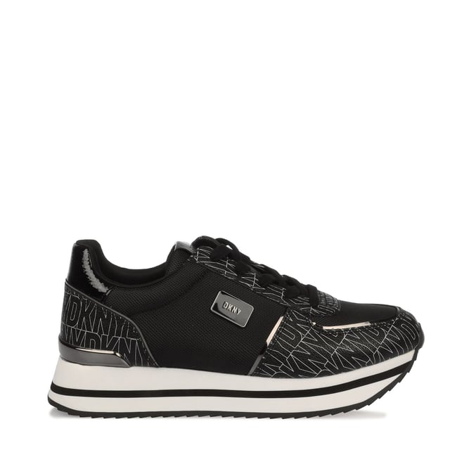 They feature a black and white design with a printed logo pattern and a platform wedge sole. Lace up fastening.Lightly padded insole.Rubber sole.