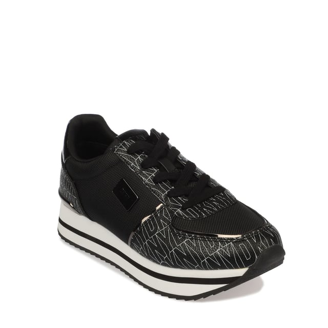 They feature a black and white design with a printed logo pattern and a platform wedge sole. Lace up fastening.Lightly padded insole.Rubber sole.