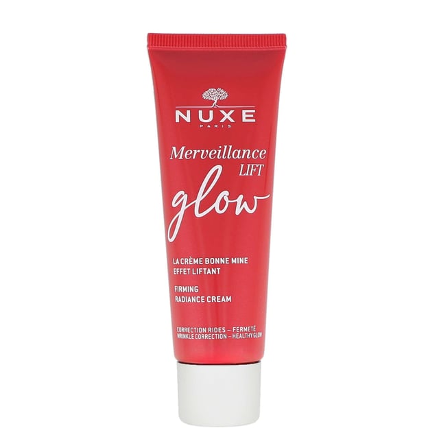Nuxe Merveillance Lift Firming Radiance Cream delivers an instant firming effect and healthy-looking glow. With daily use, wrinkles are reduced and skin feels firmer. Its melting texture and universal shade illuminate all skin tones. Formulated with ultra-correcting Micro-Algae oil and subtly tinted with tomato botanical extract for a natural radiance. Vegan friendly.

How to use: Apply morning or evening after your serum. Warm a generous amount between your hands, then smooth over face, neck and décolleté from the centre outwards. Massage until fully absorbed.