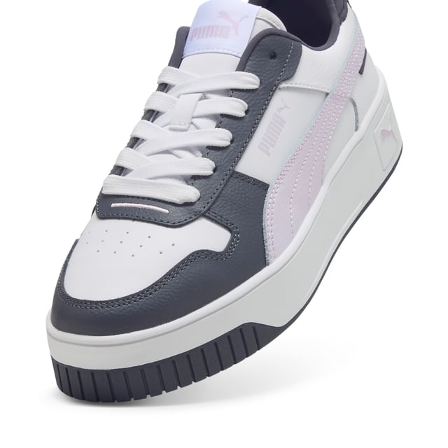 PRODUCT STORY: Streetwear-inspired design and a slightly elevated platform make these Carina's perfect for everyday outfits. FEATURES & BENEFITS: SOFTFOAM+: Step-in comfort sockliner designed to provide soft cushioning thanks to its extra thick heel; Recycled Content: The upper of this shoe is made with at least 20% recycled materials as a step toward a better future. DETAILS: Leather upper; Rubber midsole; Rubber outsole; PUMA Formstrip on the medial and lateral sides; PUMA Cat Logo on the heel.