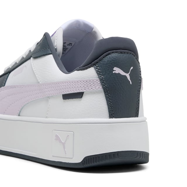 PRODUCT STORY: Streetwear-inspired design and a slightly elevated platform make these Carina's perfect for everyday outfits. FEATURES & BENEFITS: SOFTFOAM+: Step-in comfort sockliner designed to provide soft cushioning thanks to its extra thick heel; Recycled Content: The upper of this shoe is made with at least 20% recycled materials as a step toward a better future. DETAILS: Leather upper; Rubber midsole; Rubber outsole; PUMA Formstrip on the medial and lateral sides; PUMA Cat Logo on the heel.