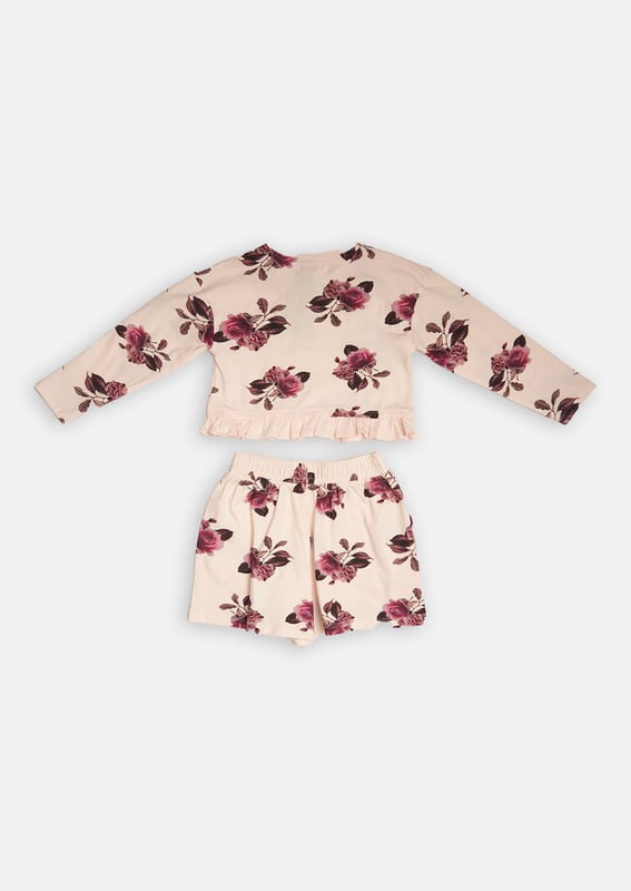 Hit the snooze button! This pyjama set is made with a supersoft cotton jersey. With an all-over beautiful bloom print and pretty ruffle details match perfectly with comfortable elasticated waist shorts.   About me: 100% Cotton Look after me: Think planet. wash at 30c.