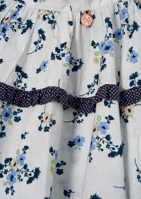 Our new Pia skirt is crafted from a delicate floral pattern and features a new silhouette with polka dot asymmetric seam detail. Wear with the Pia top for outfit perfection.. About Me: 100% Cotton. Look After Me: Think Planet. Wash At 30C.