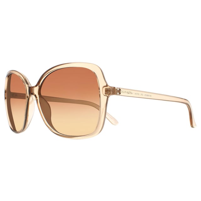 Calvin Klein Butterfly Womens Crystal Beige Brown Gradient CK19561S  CK19561S have a gorgeous butterfly shape frame made from lightweight acetate. The oversized frame is super chic and features Calvin Klein branding along the temples.