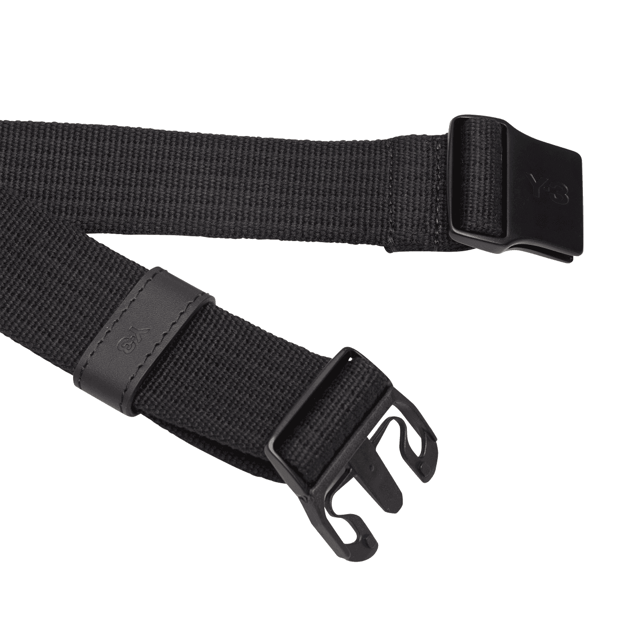 Y-3 Utility Belt in black. The Y-3 Utility Belt harnesses the power of simplicity. An understated piece  it's crafted from durable webbing and finished with a minimalist metal buckle.- An essential belt by Y-3.- Length: 50 cm.- Metal buckle closure.- Y-3 logo print.- 100% recycled polyester plain weave.- Ref: IU4623
