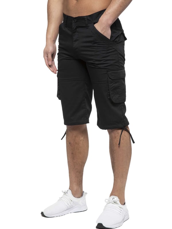 Enzo Mens Cargo Combat Jeans. 7 Pocket Design Including Single Coin Pocket. 2 Front Slash Pockets with Extra Fabric Stitching Detail. 2 Side Cargo Pockets, 2 Back Bellow Pockets with Velcro Fastening Flap. Extra Stitching Details to all Pockets. Adjustable Drawstring to the Hems. Zip Fly Fastening. Premium Quality Fabric Ideal for Casual and Heavy Duty Work Wear.