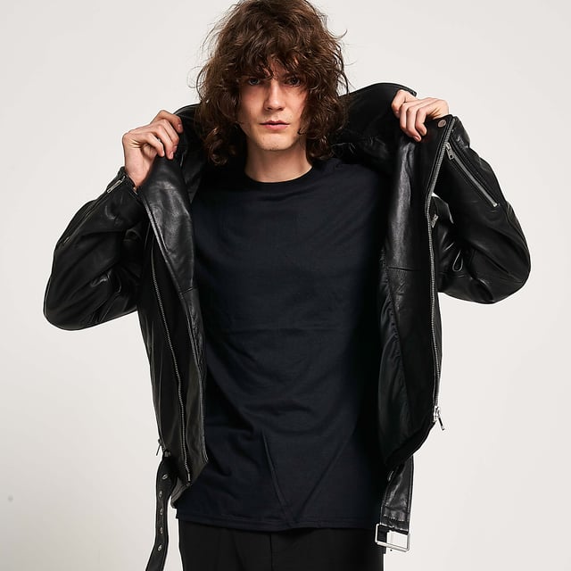 Barneys Originals real leather belted asymmetric biker jacket. Designed with a fixed belt, so you never have to worry about losing it. Finished with silver trims for a cool, edgy look.