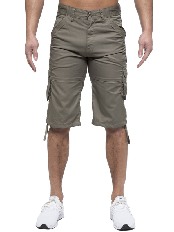Enzo Mens Cargo Combat Jeans. 7 Pocket Design Including Single Coin Pocket. 2 Front Slash Pockets with Extra Fabric Stitching Detail. 2 Side Cargo Pockets, 2 Back Bellow Pockets with Velcro Fastening Flap. Extra Stitching Details to all Pockets. Adjustable Drawstring to the Hems. Zip Fly Fastening. Premium Quality Fabric Ideal for Casual and Heavy Duty Work Wear.