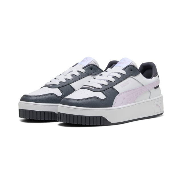 PRODUCT STORY: Streetwear-inspired design and a slightly elevated platform make these Carina's perfect for everyday outfits. FEATURES & BENEFITS: SOFTFOAM+: Step-in comfort sockliner designed to provide soft cushioning thanks to its extra thick heel; Recycled Content: The upper of this shoe is made with at least 20% recycled materials as a step toward a better future. DETAILS: Leather upper; Rubber midsole; Rubber outsole; PUMA Formstrip on the medial and lateral sides; PUMA Cat Logo on the heel.