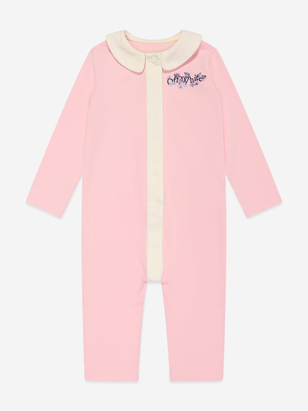 Introducing the Baby Girls Bookish Flowers Romper in Pink by Off_White - a haute couture staple for AW2024. Crafted with exquisite attention to detail, this piece merges fashion with comfort, ideal for your stylish little one. Key features of this luxurious romper include: Enchanting Floral Design: Eye-catching and chic, perfect for standout moments. Premium Fabric: Soft to the touch, ensuring all-day comfort for your baby girl. Elegant Craftsmanship: Impeccable stitching and finishes, embodying the quality of Off_White.Revitalise her wardrobe with this charming, high-end romper. Embrace style and comfort, order now!