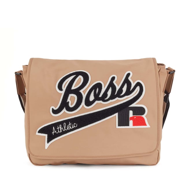 Structured nylon with firm hand feel. Main compartment with flap and velcro closure. Internal zip pocket. Adjustable shoulder strap. Capsule BOSS for Russell Athletic. Dimensions: 40 x 38 x 9 cm. Material: 100% Polyamide. Ref: 50465332262.