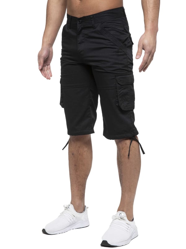 Enzo Mens Cargo Combat Jeans. 7 Pocket Design Including Single Coin Pocket. 2 Front Slash Pockets with Extra Fabric Stitching Detail. 2 Side Cargo Pockets, 2 Back Bellow Pockets with Velcro Fastening Flap. Extra Stitching Details to all Pockets. Adjustable Drawstring to the Hems. Zip Fly Fastening. Premium Quality Fabric Ideal for Casual and Heavy Duty Work Wear.