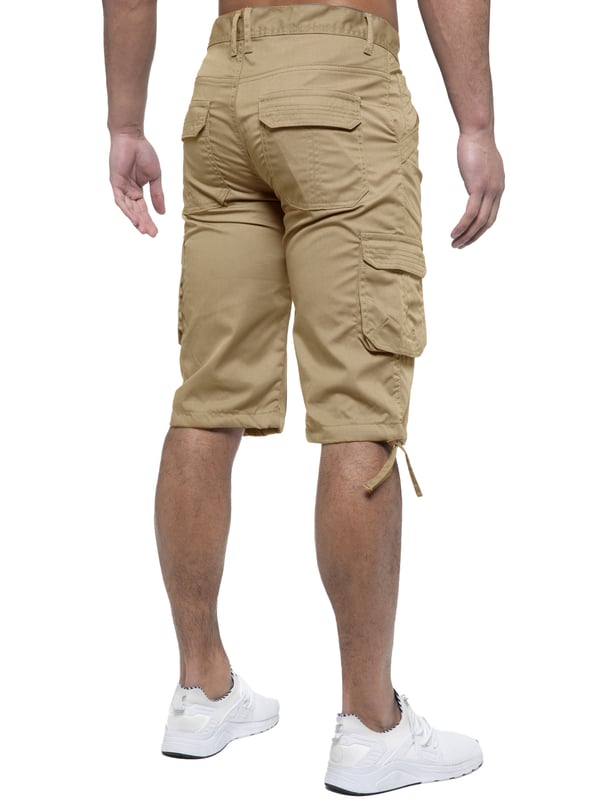 Enzo Mens Cargo Combat Jeans. 7 Pocket Design Including Single Coin Pocket. 2 Front Slash Pockets with Extra Fabric Stitching Detail. 2 Side Cargo Pockets, 2 Back Bellow Pockets with Velcro Fastening Flap. Extra Stitching Details to all Pockets. Adjustable Drawstring to the Hems. Zip Fly Fastening. Premium Quality Fabric Ideal for Casual and Heavy Duty Work Wear.