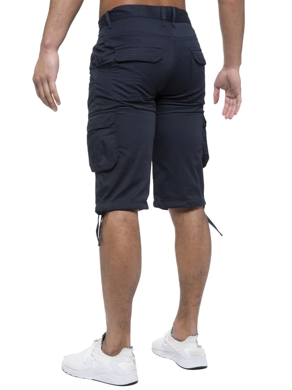 Enzo Mens Cargo Combat Jeans. 7 Pocket Design Including Single Coin Pocket. 2 Front Slash Pockets with Extra Fabric Stitching Detail. 2 Side Cargo Pockets, 2 Back Bellow Pockets with Velcro Fastening Flap. Extra Stitching Details to all Pockets. Adjustable Drawstring to the Hems. Zip Fly Fastening. Premium Quality Fabric Ideal for Casual and Heavy Duty Work Wear.