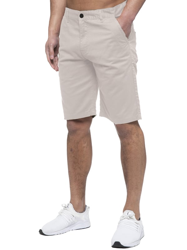 Experience the ultimate in comfort and style with Enzo | Mens Chino Shorts! Featuring 2 front pockets and 2 back pockets, a zip fly fastening, and 100% cotton material, these shorts are perfect for the summer. Machine washable for easy maintenance (please see care labels), these designer shorts are a must-have addition to any fashion-forward wardrobe. Order now and elevate your summer look!