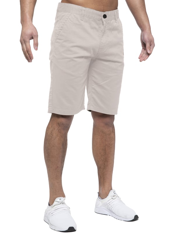 Experience the ultimate in comfort and style with Enzo | Mens Chino Shorts! Featuring 2 front pockets and 2 back pockets, a zip fly fastening, and 100% cotton material, these shorts are perfect for the summer. Machine washable for easy maintenance (please see care labels), these designer shorts are a must-have addition to any fashion-forward wardrobe. Order now and elevate your summer look!