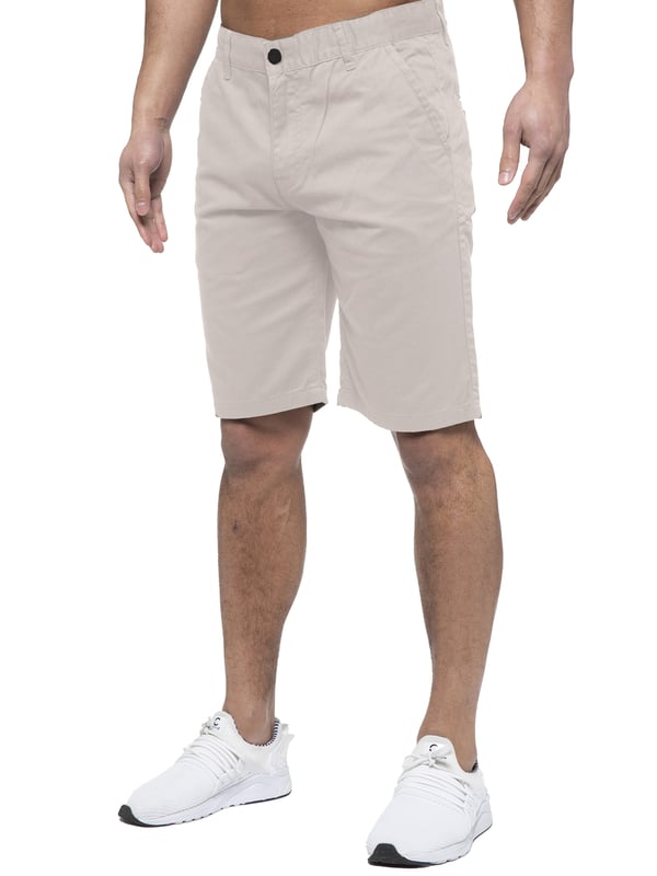 Experience the ultimate in comfort and style with Enzo | Mens Chino Shorts! Featuring 2 front pockets and 2 back pockets, a zip fly fastening, and 100% cotton material, these shorts are perfect for the summer. Machine washable for easy maintenance (please see care labels), these designer shorts are a must-have addition to any fashion-forward wardrobe. Order now and elevate your summer look!