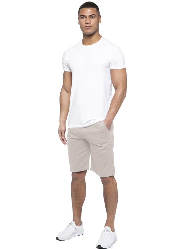 Experience the ultimate in comfort and style with Enzo | Mens Chino Shorts! Featuring 2 front pockets and 2 back pockets, a zip fly fastening, and 100% cotton material, these shorts are perfect for the summer. Machine washable for easy maintenance (please see care labels), these designer shorts are a must-have addition to any fashion-forward wardrobe. Order now and elevate your summer look!
