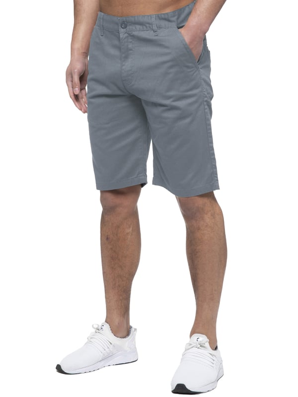 Experience the ultimate in comfort and style with Enzo | Mens Chino Shorts! Featuring 2 front pockets and 2 back pockets, a zip fly fastening, and 100% cotton material, these shorts are perfect for the summer. Machine washable for easy maintenance (please see care labels), these designer shorts are a must-have addition to any fashion-forward wardrobe. Order now and elevate your summer look!