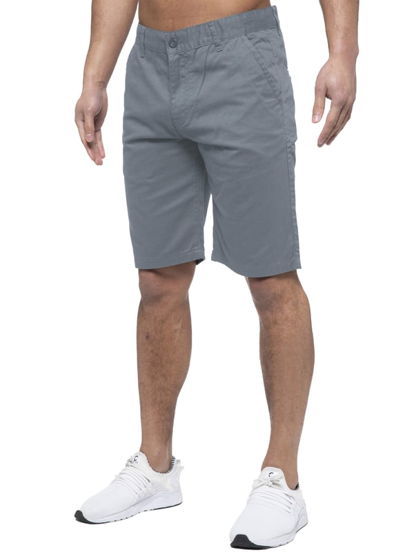 Experience the ultimate in comfort and style with Enzo | Mens Chino Shorts! Featuring 2 front pockets and 2 back pockets, a zip fly fastening, and 100% cotton material, these shorts are perfect for the summer. Machine washable for easy maintenance (please see care labels), these designer shorts are a must-have addition to any fashion-forward wardrobe. Order now and elevate your summer look!