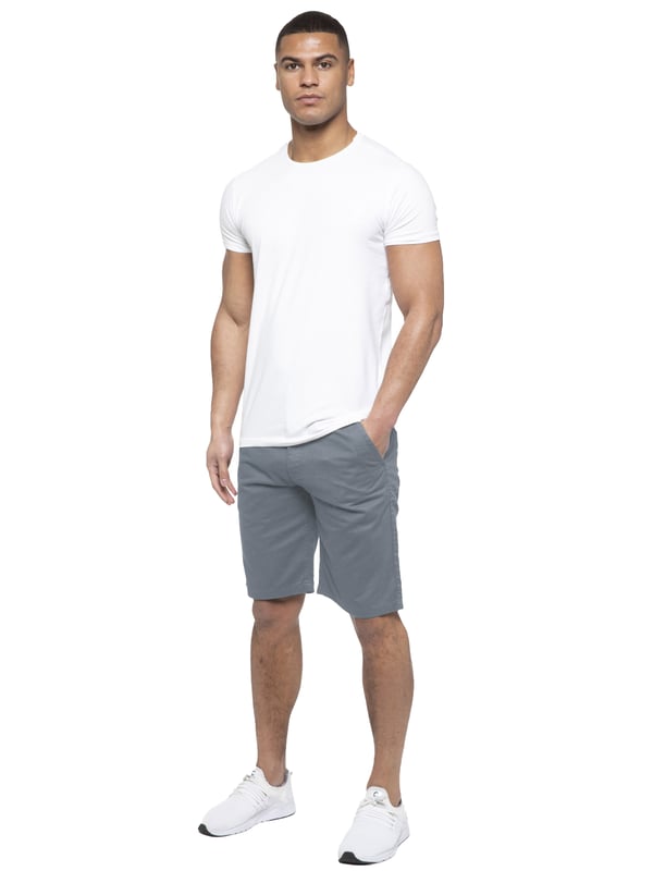 Experience the ultimate in comfort and style with Enzo | Mens Chino Shorts! Featuring 2 front pockets and 2 back pockets, a zip fly fastening, and 100% cotton material, these shorts are perfect for the summer. Machine washable for easy maintenance (please see care labels), these designer shorts are a must-have addition to any fashion-forward wardrobe. Order now and elevate your summer look!