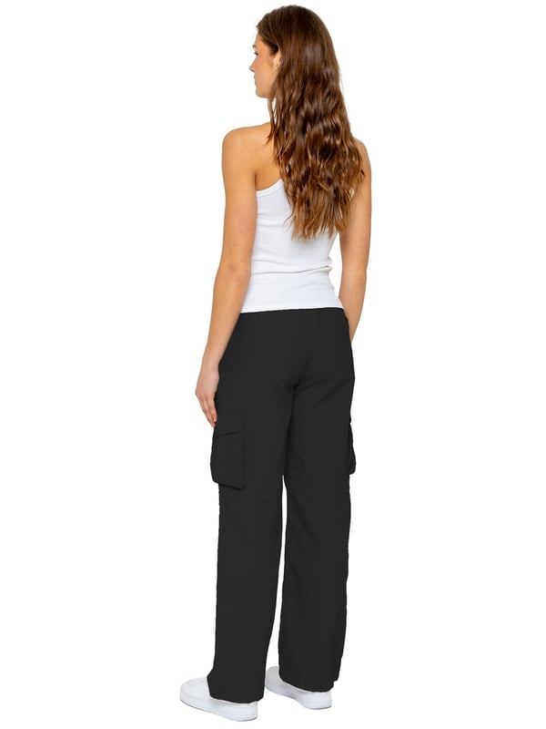 Stay effortlessly stylish in the Enzo Women's Parachute Cargo Pants. Made from lightweight crushed poly fabric, they feature a relaxed fit, wide-leg cut, and an elasticated waistband with adjustable drawstring for all-day comfort. With multiple pockets—including cargo styles with velcro fastening—and adjustable drawcord hems, these utility-inspired trousers blend function with streetwear flair. Ideal for casual, off-duty looks.