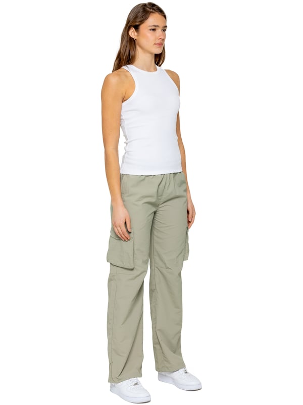 Stay effortlessly stylish in the Enzo Women's Parachute Cargo Pants. Made from lightweight crushed poly fabric, they feature a relaxed fit, wide-leg cut, and an elasticated waistband with adjustable drawstring for all-day comfort. With multiple pockets—including cargo styles with velcro fastening—and adjustable drawcord hems, these utility-inspired trousers blend function with streetwear flair. Ideal for casual, off-duty looks.