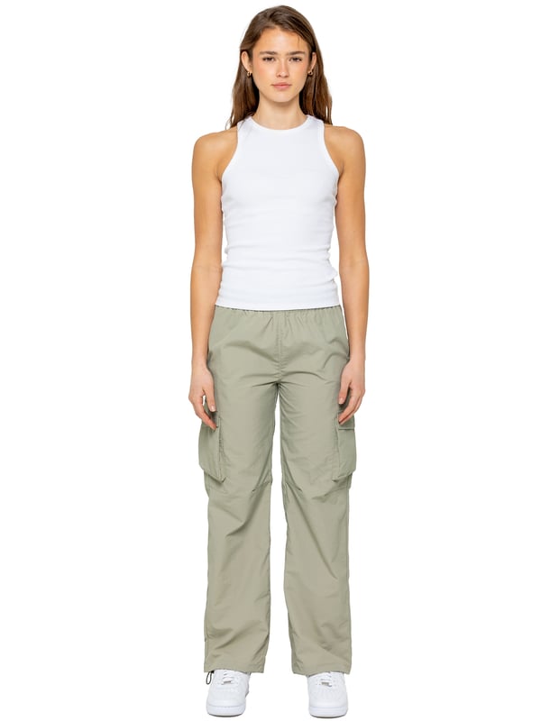 Stay effortlessly stylish in the Enzo Women's Parachute Cargo Pants. Made from lightweight crushed poly fabric, they feature a relaxed fit, wide-leg cut, and an elasticated waistband with adjustable drawstring for all-day comfort. With multiple pockets—including cargo styles with velcro fastening—and adjustable drawcord hems, these utility-inspired trousers blend function with streetwear flair. Ideal for casual, off-duty looks.
