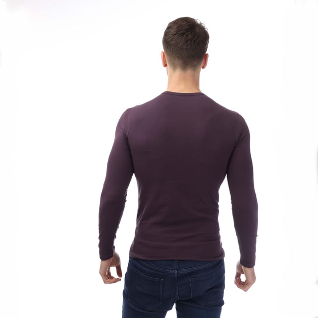 Mens Emporio Armani Loungewear Fitted Mock Neck Top in navy.- Mock neck.- Long sleeves.- Eagle embroidery.- Fitted fit.- 90% Modal  10% Elastane.- Ref: 1120664F500135