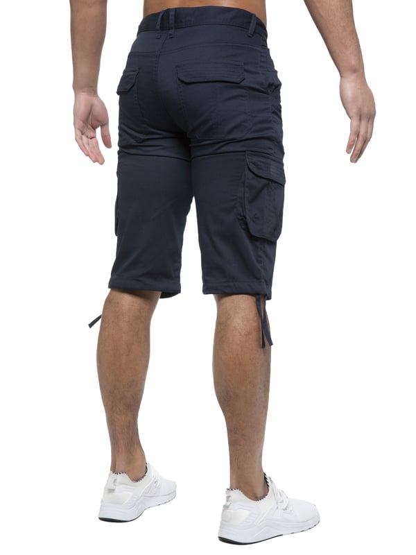 Enzo Mens Cargo Combat Jeans. 7 Pocket Design Including Single Coin Pocket. 2 Front Slash Pockets with Extra Fabric Stitching Detail. 2 Side Cargo Pockets, 2 Back Bellow Pockets with Velcro Fastening Flap. Extra Stitching Details to all Pockets. Adjustable Drawstring to the Hems. Zip Fly Fastening. Premium Quality Fabric Ideal for Casual and Heavy Duty Work Wear.