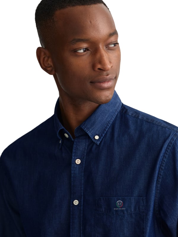 Introducing Enzo Milano Men's Shirts: the epitome of luxury. Impeccably crafted with lightweight, breathable cotton, these Regular Fit shirts feature a sophisticated Button-Down Collar and Long Sleeves for a timeless look. Each shirt is adorned with the Enzo Milano Logo, embroidered on the chest for a touch of exclusivity