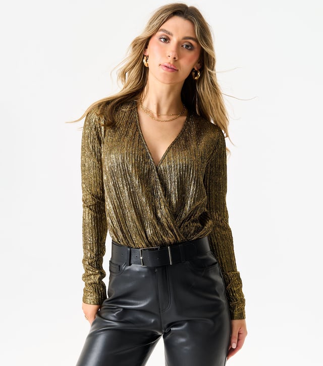 Elevate your fashion game with this Metallic Plisse Wrap Front Bodysuit. The metallic finish adds a touch of glamour to your outfit, while the wrap front design flatters your figure. The bodysuit is perfect for a night out, an event, or any occasion where you want to make a statement.