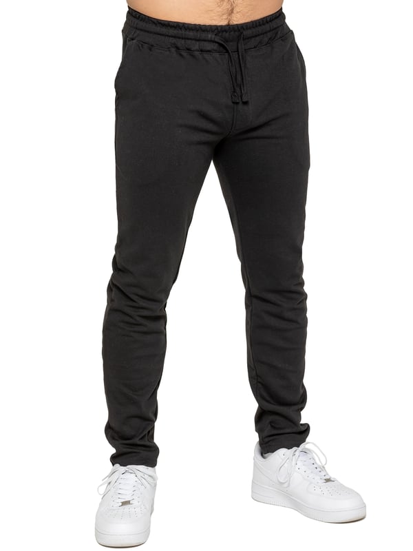 Upgrade your everyday style with the Enzo Smart Stretch Joggers, designed for both comfort and versatility. Featuring an elasticated waistband with an adjustable drawstring, these joggers ensure a secure and personalized fit. The straight-leg design offers a sleek, modern look, while the premium stretch fabric provides ultimate flexibility and all-day comfort. Functional yet stylish, they come with two side entry pockets and two back welt pockets. These joggers are the perfect blend of smart tailoring and relaxed wearability.
