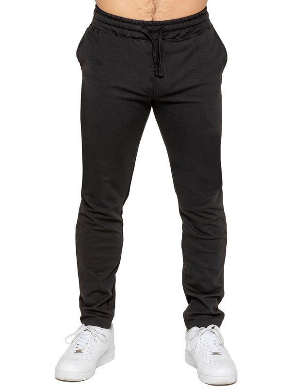 Upgrade your everyday style with the Enzo Smart Stretch Joggers, designed for both comfort and versatility. Featuring an elasticated waistband with an adjustable drawstring, these joggers ensure a secure and personalized fit. The straight-leg design offers a sleek, modern look, while the premium stretch fabric provides ultimate flexibility and all-day comfort. Functional yet stylish, they come with two side entry pockets and two back welt pockets. These joggers are the perfect blend of smart tailoring and relaxed wearability.
