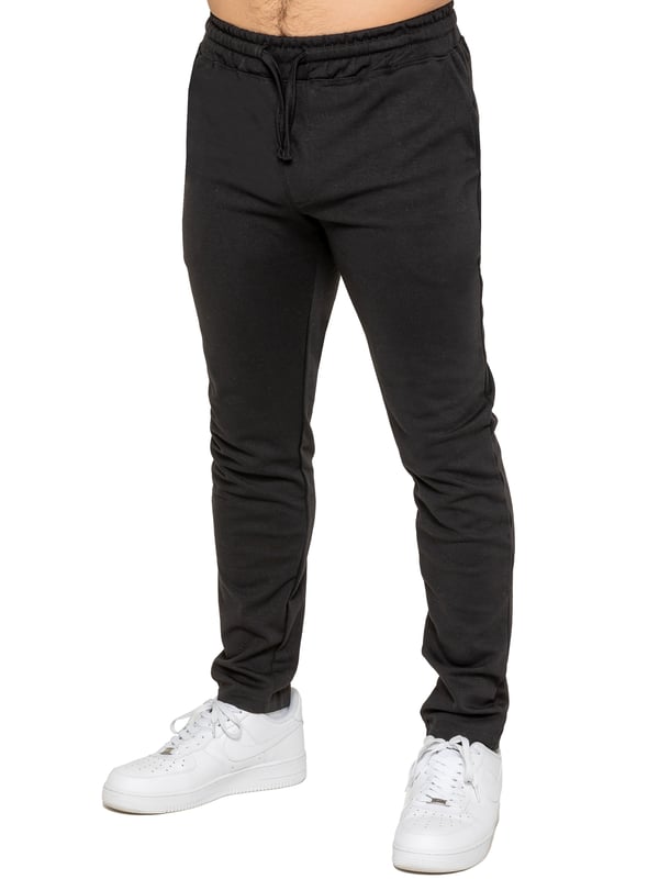 Upgrade your everyday style with the Enzo Smart Stretch Joggers, designed for both comfort and versatility. Featuring an elasticated waistband with an adjustable drawstring, these joggers ensure a secure and personalized fit. The straight-leg design offers a sleek, modern look, while the premium stretch fabric provides ultimate flexibility and all-day comfort. Functional yet stylish, they come with two side entry pockets and two back welt pockets. These joggers are the perfect blend of smart tailoring and relaxed wearability.