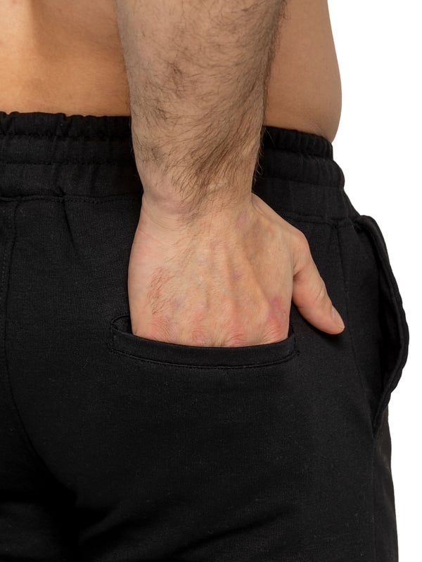 Upgrade your everyday style with the Enzo Smart Stretch Joggers, designed for both comfort and versatility. Featuring an elasticated waistband with an adjustable drawstring, these joggers ensure a secure and personalized fit. The straight-leg design offers a sleek, modern look, while the premium stretch fabric provides ultimate flexibility and all-day comfort. Functional yet stylish, they come with two side entry pockets and two back welt pockets. These joggers are the perfect blend of smart tailoring and relaxed wearability.