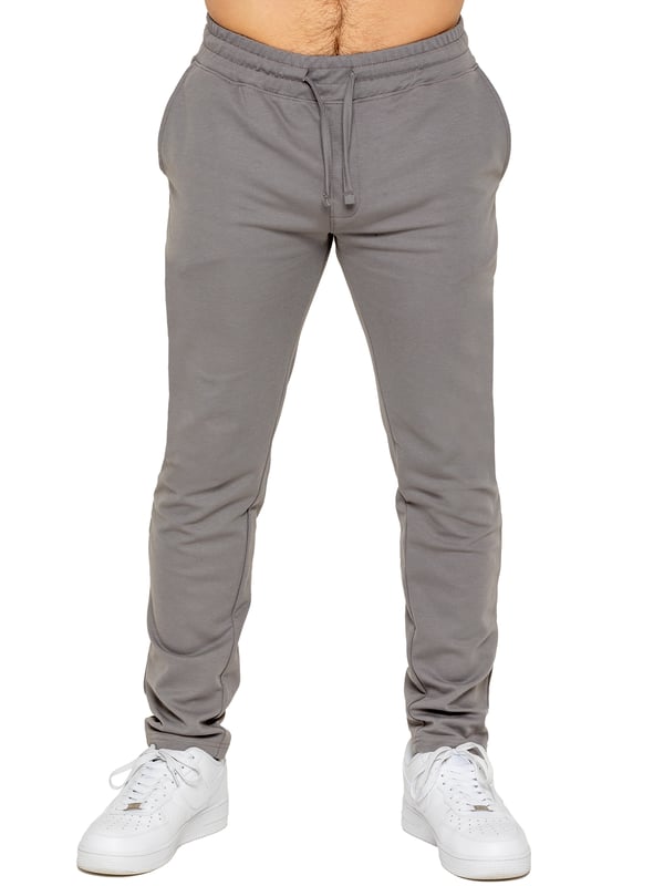 Upgrade your everyday style with the Enzo Smart Stretch Joggers, designed for both comfort and versatility. Featuring an elasticated waistband with an adjustable drawstring, these joggers ensure a secure and personalized fit. The straight-leg design offers a sleek, modern look, while the premium stretch fabric provides ultimate flexibility and all-day comfort. Functional yet stylish, they come with two side entry pockets and two back welt pockets. These joggers are the perfect blend of smart tailoring and relaxed wearability.