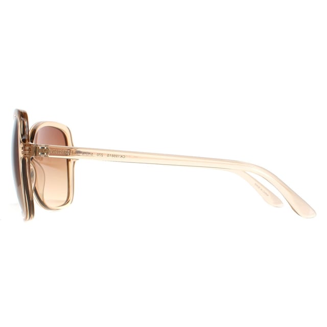 Calvin Klein Butterfly Womens Crystal Beige Brown Gradient CK19561S  CK19561S have a gorgeous butterfly shape frame made from lightweight acetate. The oversized frame is super chic and features Calvin Klein branding along the temples.