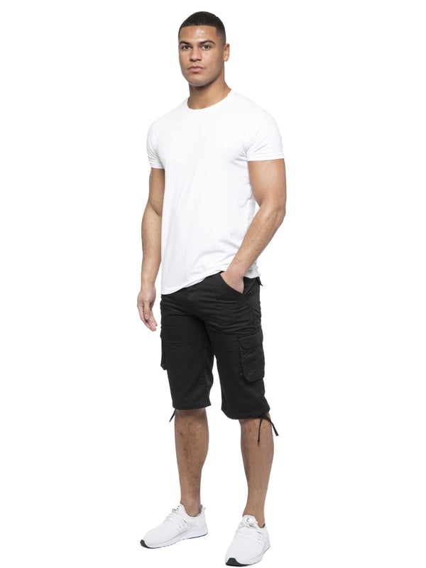 Enzo Mens Cargo Combat Jeans. 7 Pocket Design Including Single Coin Pocket. 2 Front Slash Pockets with Extra Fabric Stitching Detail. 2 Side Cargo Pockets, 2 Back Bellow Pockets with Velcro Fastening Flap. Extra Stitching Details to all Pockets. Adjustable Drawstring to the Hems. Zip Fly Fastening. Premium Quality Fabric Ideal for Casual and Heavy Duty Work Wear.