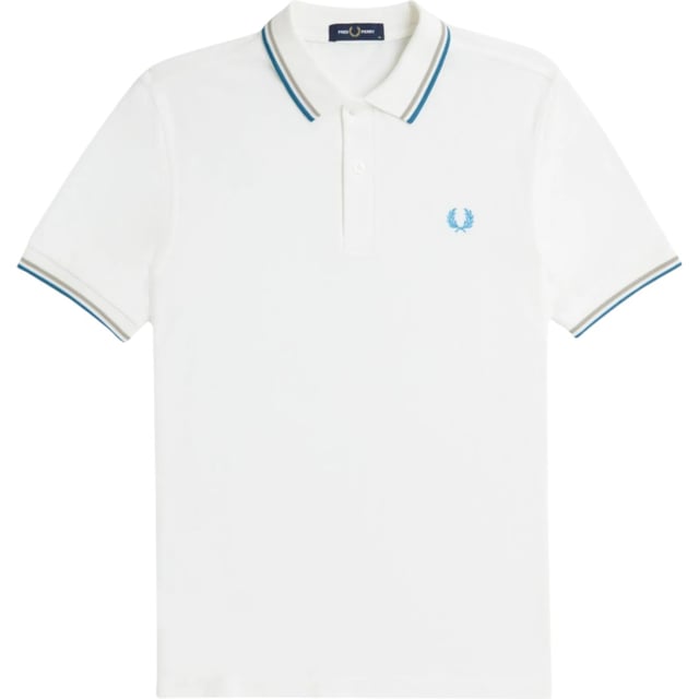 The Twin Tipped Fred Perry Polo Shirt by Fred Perry is a short sleeved polo shirt that has been made from Fred Perry's classic cotton piqué, in a contemporary adaptation of Fred's famous streamlined fit. Available in a diverse range of colourways - each with their own unique story. Featuring the signature Fred Perry wreath logo to the chest and twin tipping to the collar and cuffs.