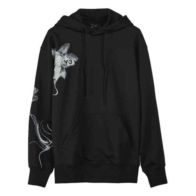 Y-3 Graphic French Terry Hoodie in black. The Y-3 Graphic French Terry Hoodie blends essential everyday wear with graphic style. An abstract floral print sits on the chest and wraps the sleeve. Cotton French terry fabricates a relaxed build  and a kangaroo pocket emphasises laid-back comfort.- A casual Y-3 hoodie.- Regular fit.- Drawcord-adjustable hood.- Long sleeves with drop shoulder.- Kangaroo pocket.- Ribbed cuffs and hem.- Y-3 logo.- 80% cotton  20% polyester (recycled).  Machine washable.- Ref: IN4335