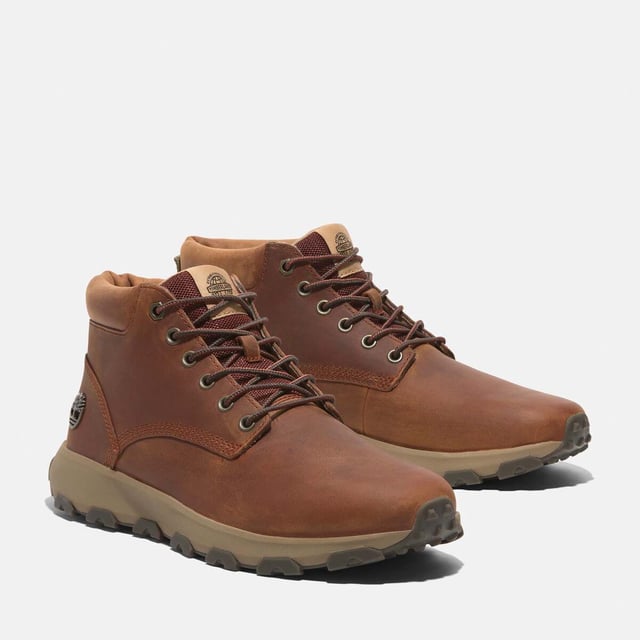 Timberland Windsor Park Mid Lace-Up Boots in orange.- Upper made with waterproof Premium Timberland® Leather.- Lace-up style.- GORE-TEX bootie construction.- EVA footbed.- ReBOTL™ fabric lining containing 50% recycled PET plastic.- Rubber outsole.- Ref: A69MNEJD1
