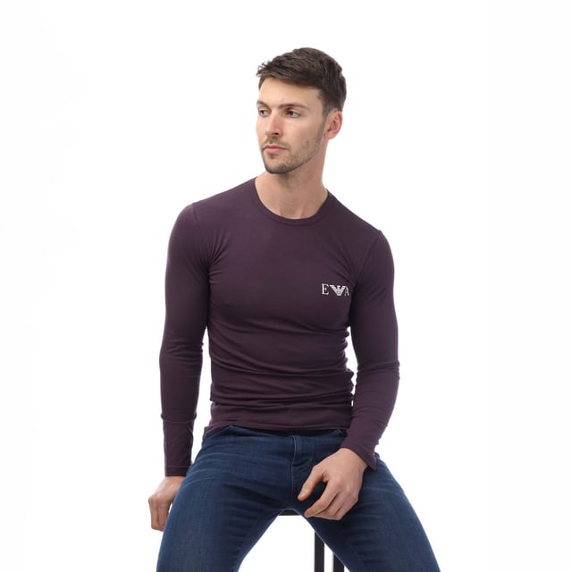 Mens Emporio Armani Loungewear Fitted Mock Neck Top in navy.- Mock neck.- Long sleeves.- Eagle embroidery.- Fitted fit.- 90% Modal  10% Elastane.- Ref: 1120664F500135