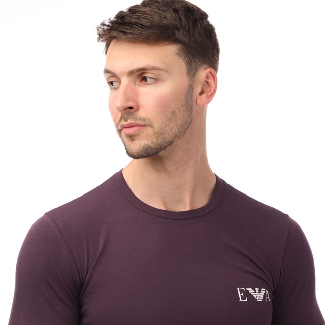 Mens Emporio Armani Loungewear Fitted Mock Neck Top in navy.- Mock neck.- Long sleeves.- Eagle embroidery.- Fitted fit.- 90% Modal  10% Elastane.- Ref: 1120664F500135