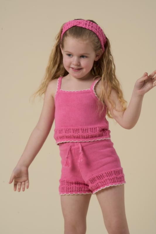 This adorable set by Miss includes a true knit top, comfy shorts, and a matching headband. Perfect for warm days, it combines style and practicality, making it an ideal choice for playdates, outings, or casual summer looks.
