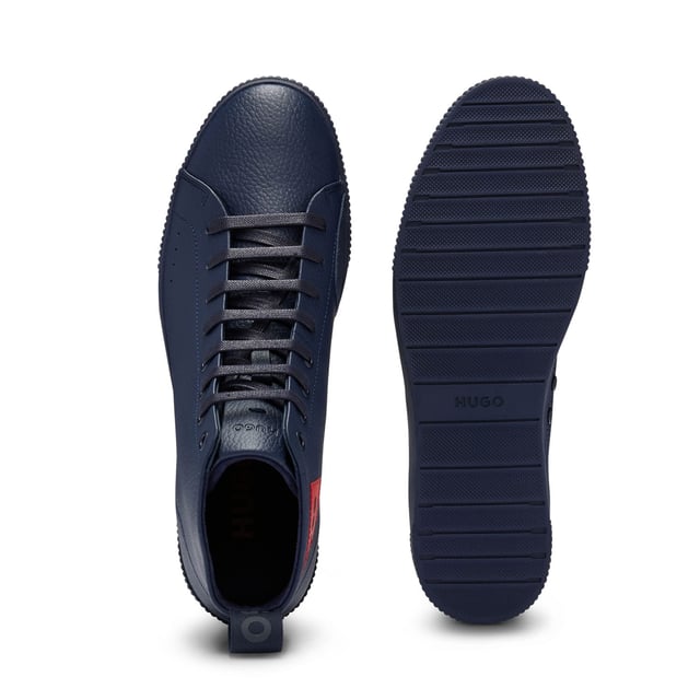 Men's Hugo Zero Hi-Top Trainers in Dark Blue Mens HUGO Zero Hi-Top Trainers in dark blue.- Grainy leather Rubber sole- Construction: Cemented- Big woven label with reversed logo HUGO icon- Ref: 50471336-401