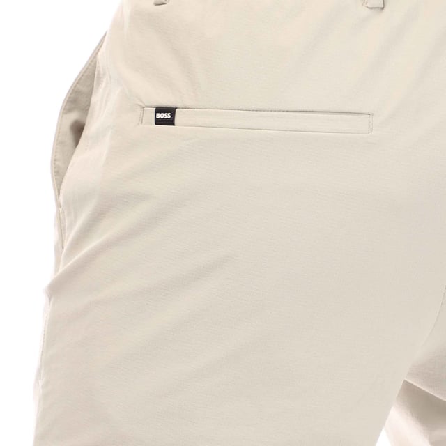 Mens BOSS P-Genius Trousers in white.- Button and zip closure.- Side pockets.- Back zip pocket. - Small BOSS woven label at the rear delivers discreet brand recognition and a sleek finish.- Slim fit.- 88% Polyamide  12% Elastane.- Ref: 50497236131