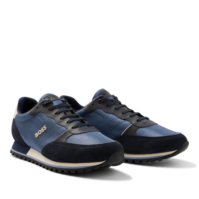 Sporty BOSS running inspired sneakers. Modern upper design in nylon enriched by raised BOSS logo on the quarter. Lightweight EVA providing comfort and extra cushioning. Modern rubber and rubberised detail assure a sporty look.